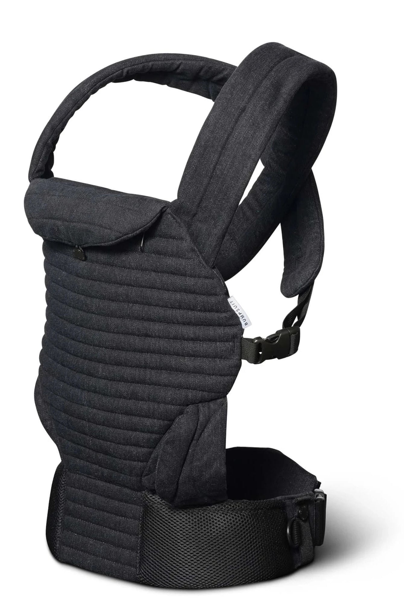 A Bumpsuit black denim quilted baby carrier with padded shoulder straps and a breathable waist belt, shown from a three-quarter angle on a white background.