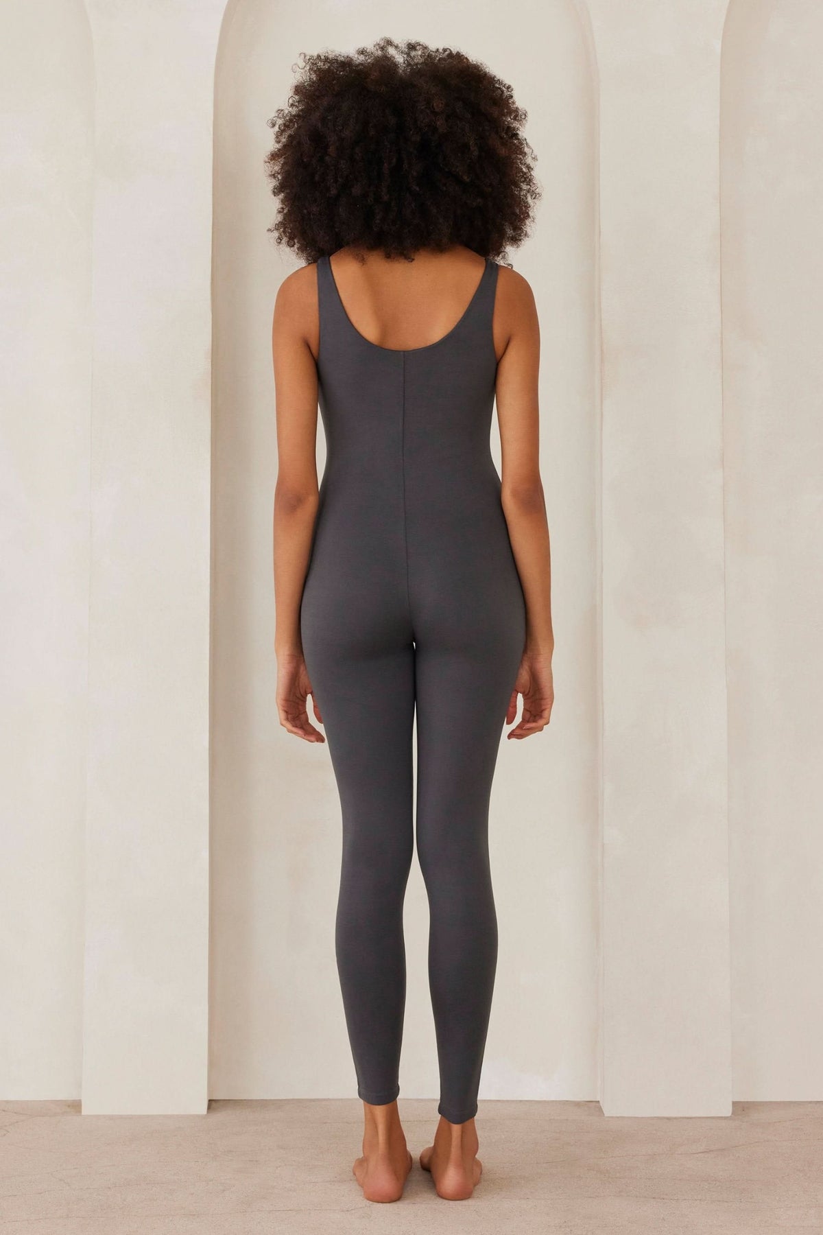 back view of the bumpsuit maternity Lucy scoop neck sleeveless jumpsuit in slate