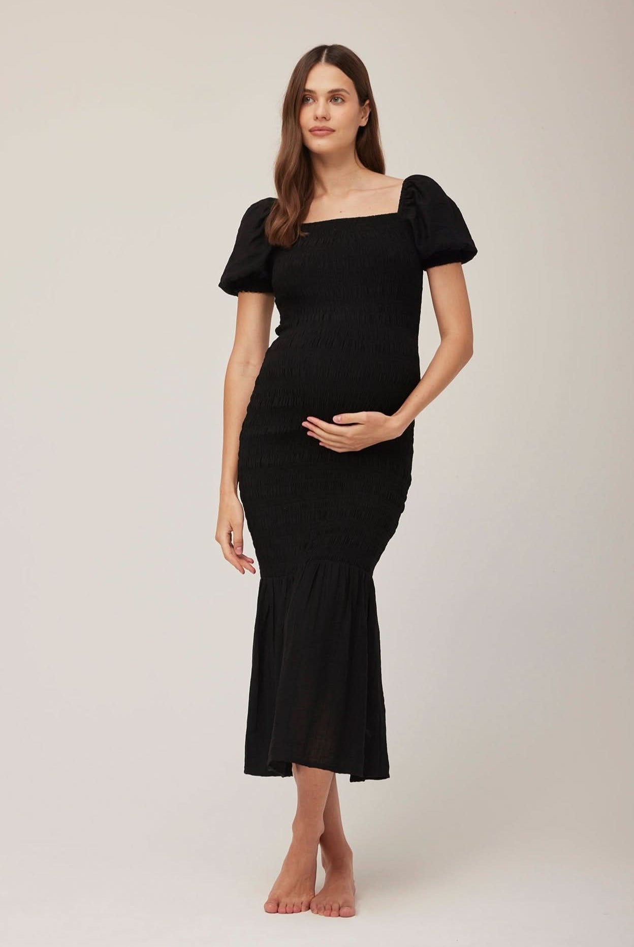 Bumpsuit Maternity Vacation Collection feat. Georgia Fowler the Shirred Puff Sleeve Dress in Black