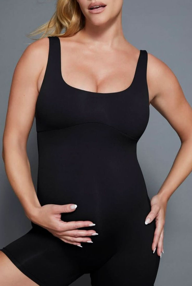 bumpsuit activewear perfect movement onesie in black worn by nina agdal