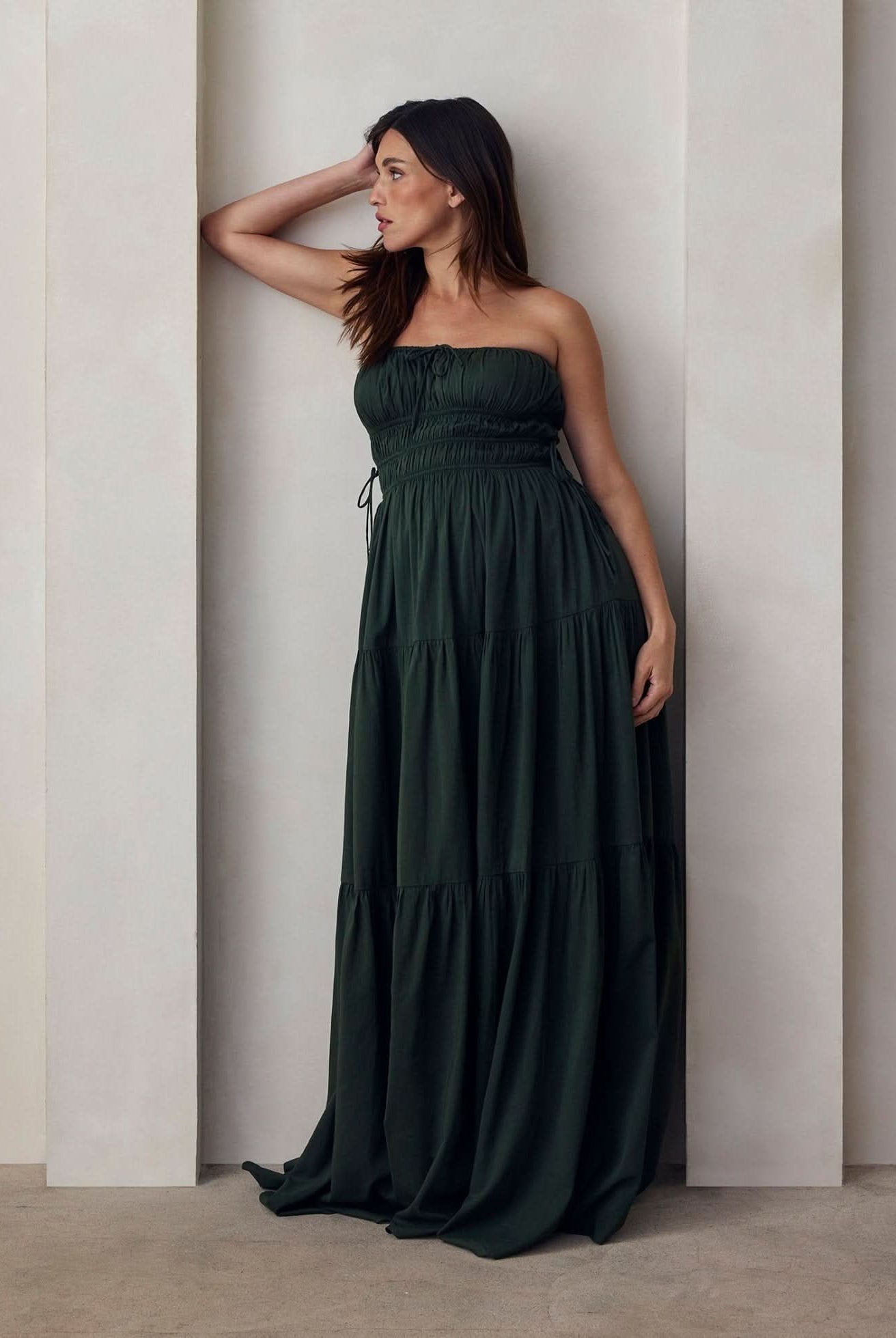 the bumpsuit maternity shirred strapless floor length gown in forest green