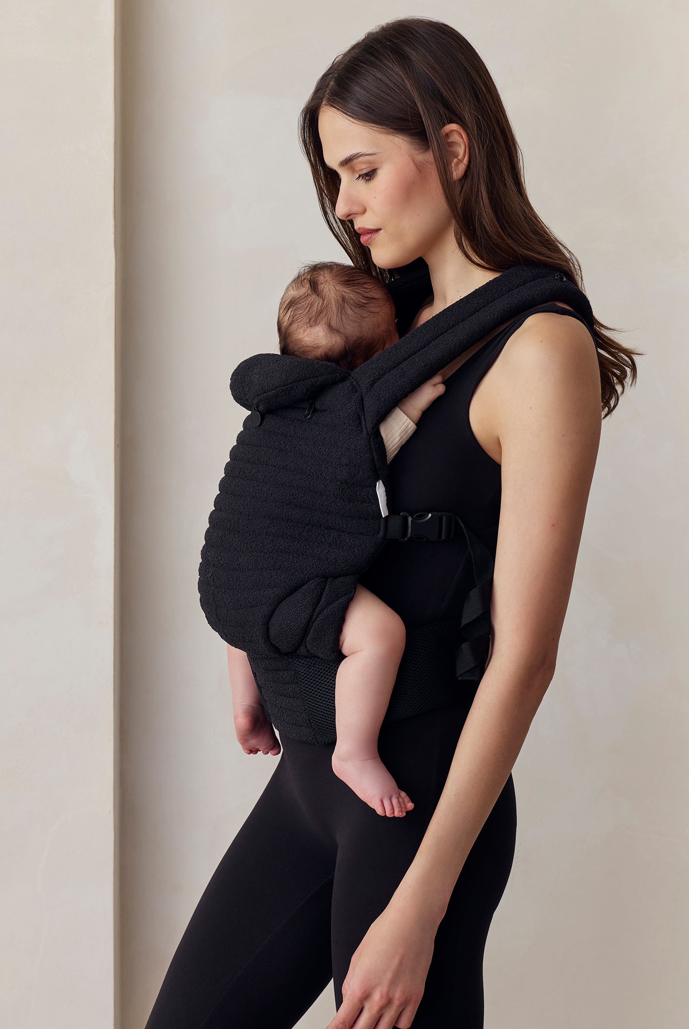 the armadillo baby carrier in black boucle