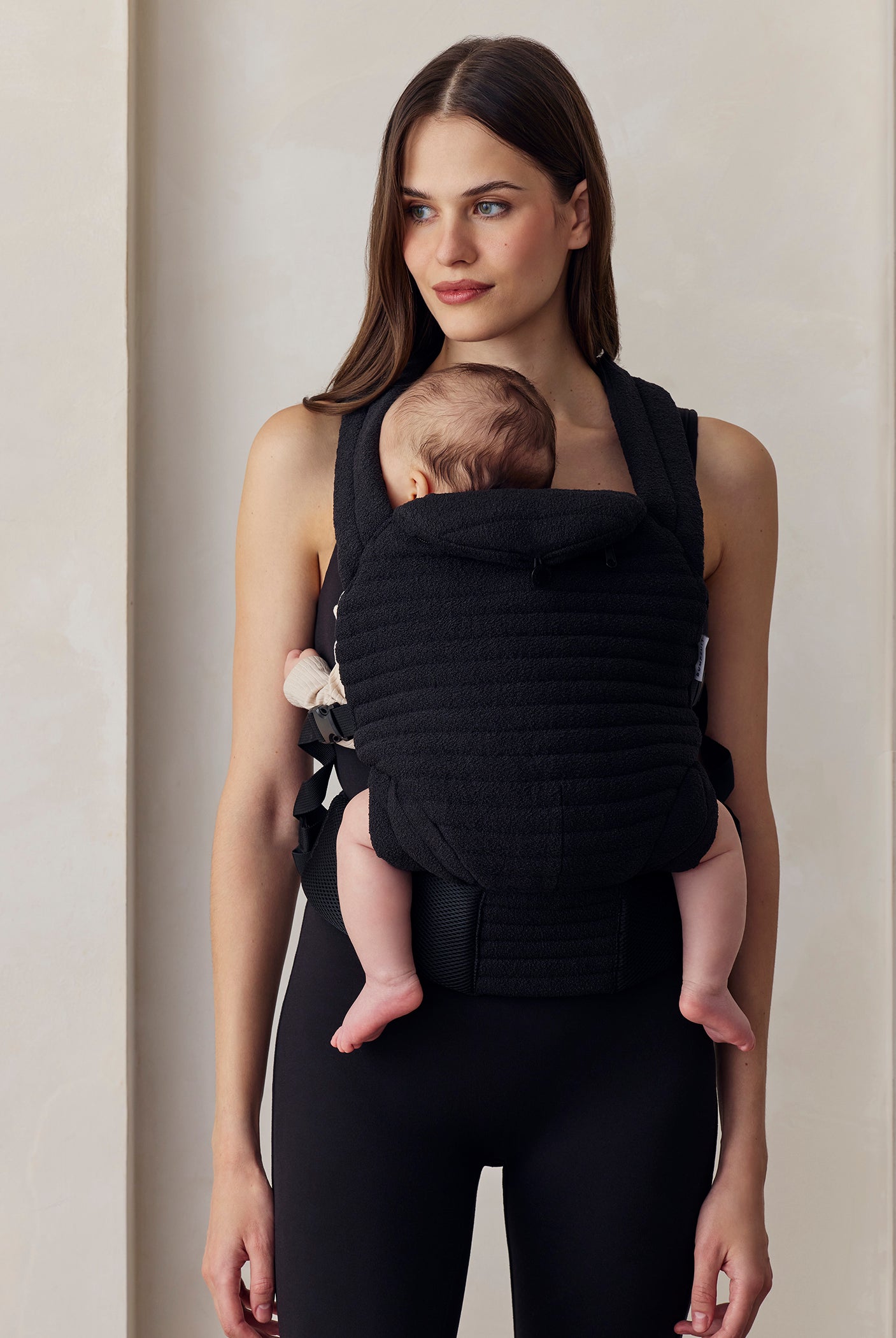 the armadillo baby carrier in black boucle