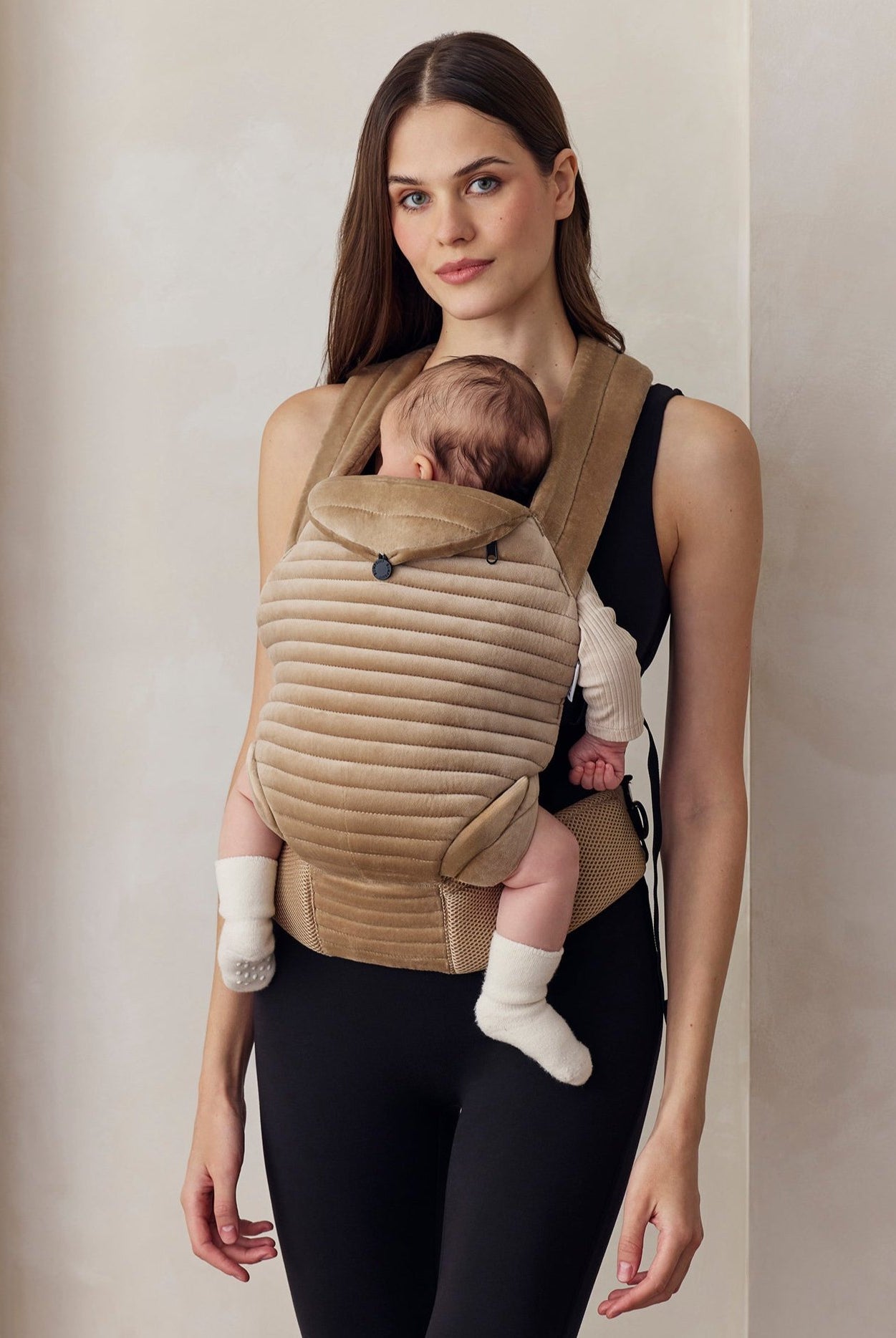 the armadillo baby carrier in dune velvet