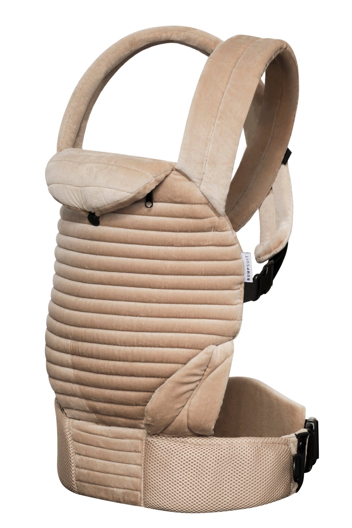 side view of the armadillo baby carrier in a beige velvet on a white background