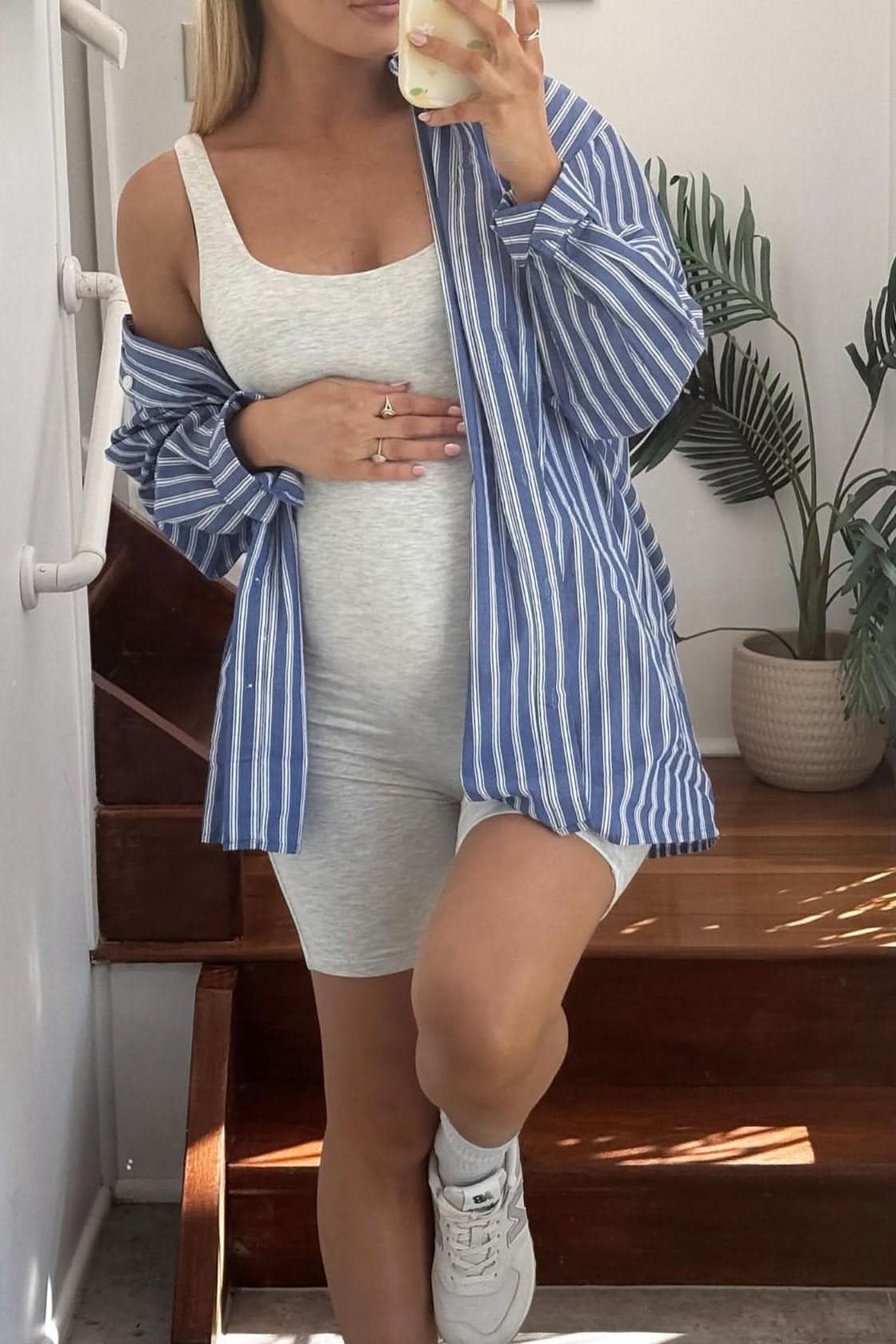 Kathryn Denny wearing the the cindy cotton maternity romper in heather grey