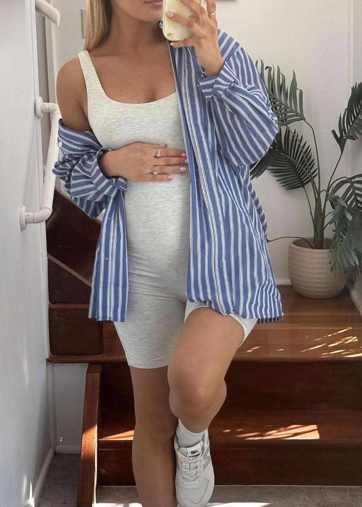 Kathryn Denny wearing the the cindy cotton maternity romper in heather grey