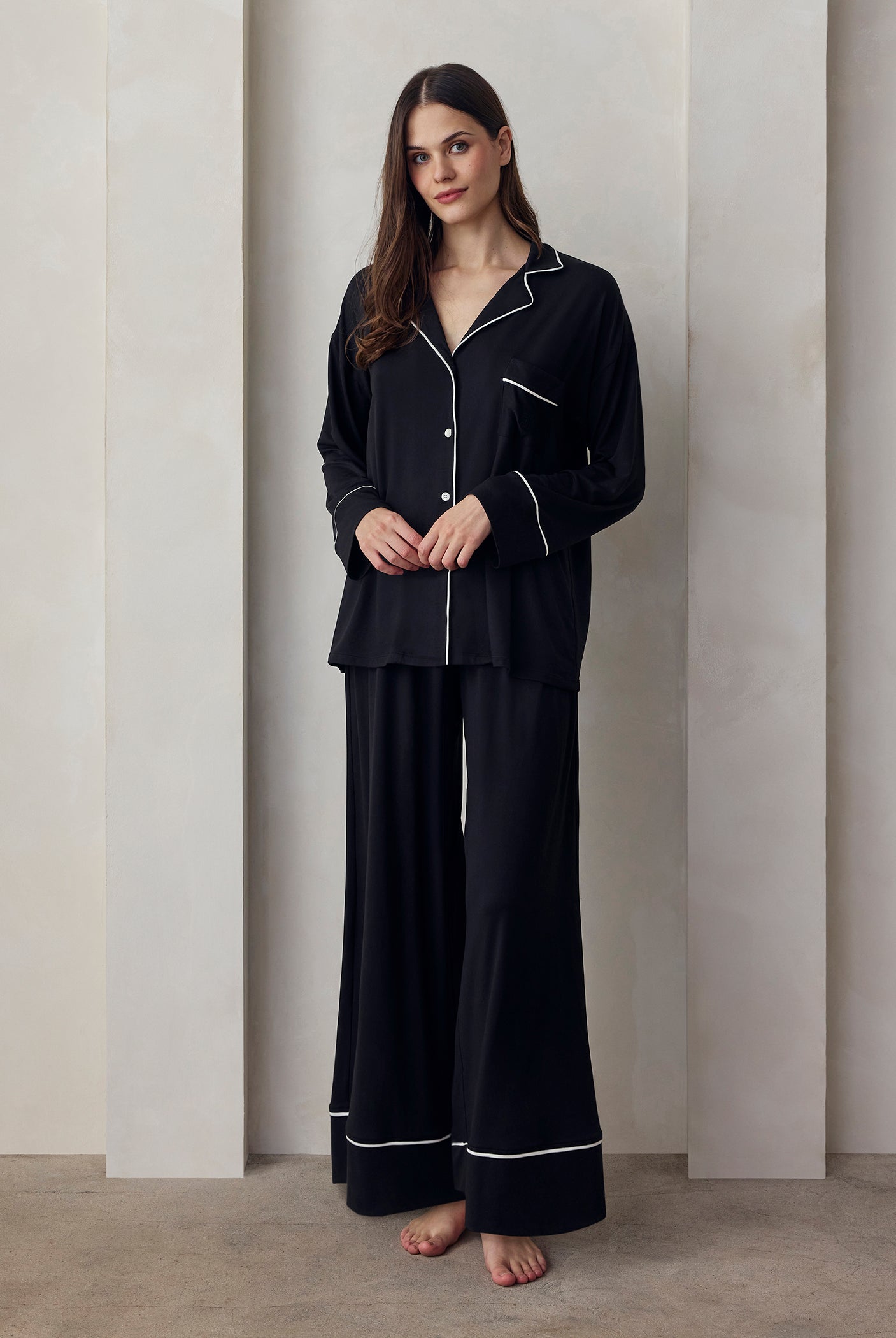 the cloud sleep set in black with white piping detail