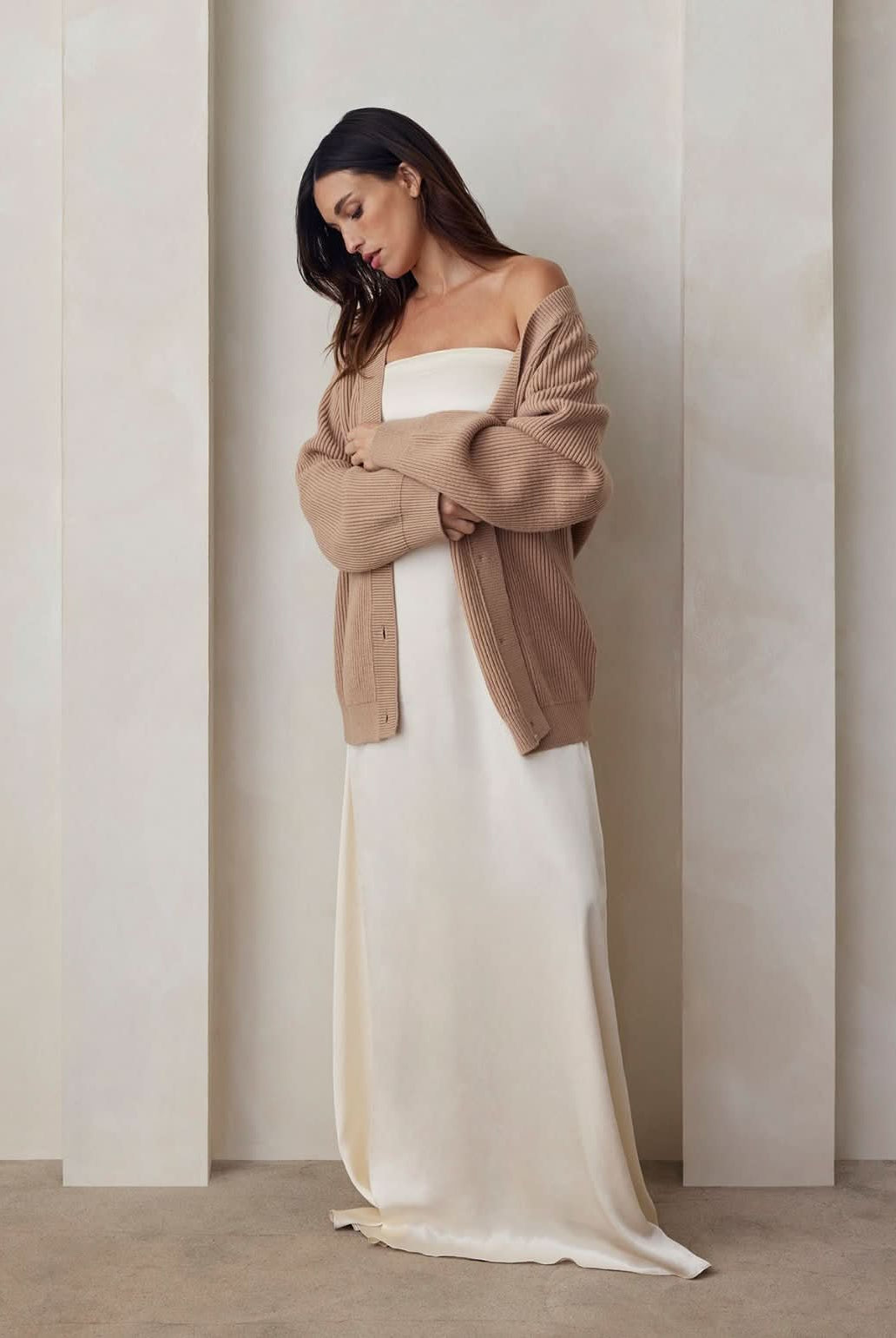 the strapless satin gown and cozy knit cardigan bumpsuit