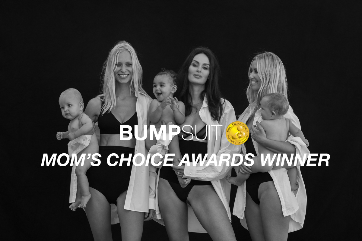 Three women holding babies in a black and white BUMPSUIT photo with Moms Choice Awards Winner headline