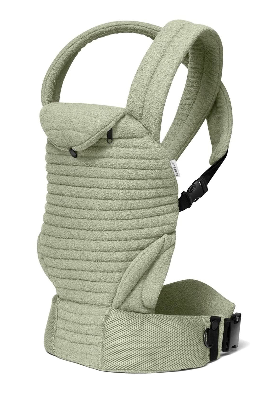 Side view of the Matcha Armadillo Baby Carrier showcasing padded shoulder straps and mesh waist belt with white background