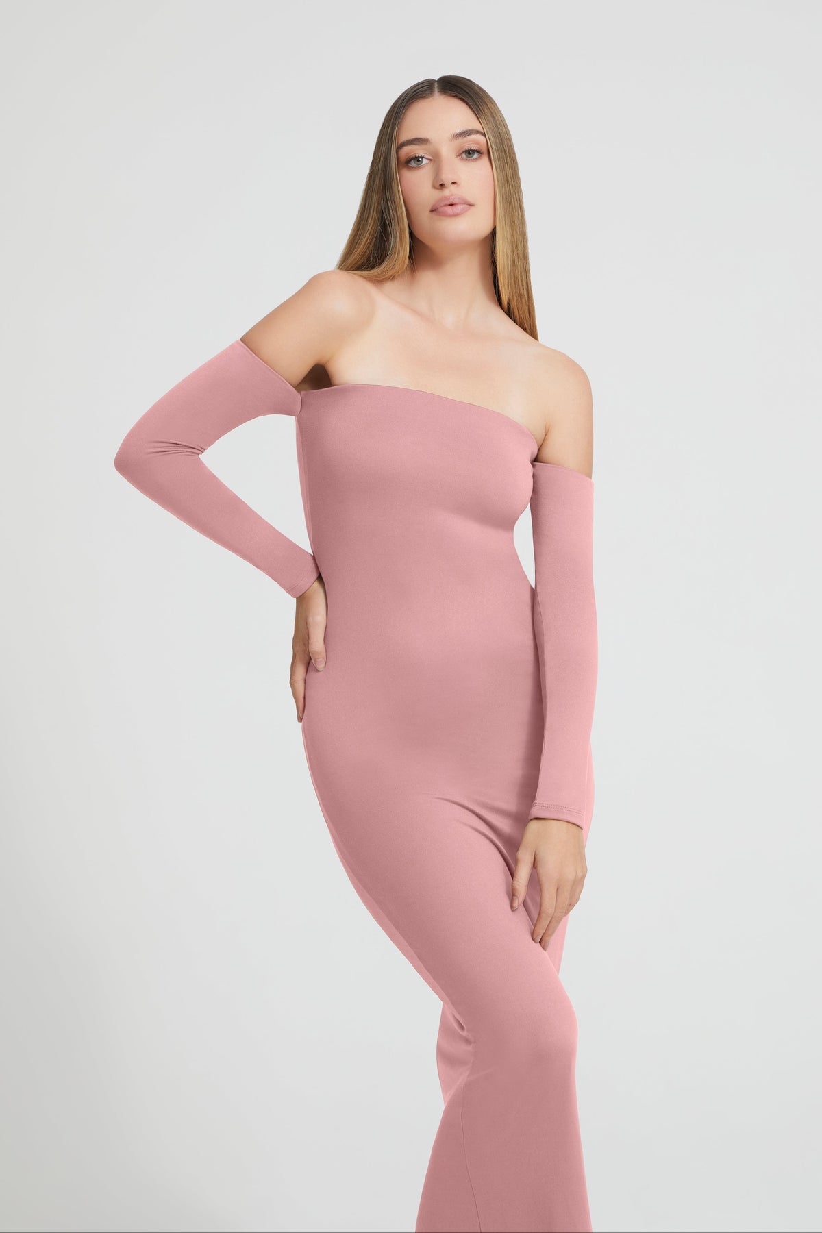 Front view of The Angelina maternity maxi dress showcasing mauve off-the-shoulder attached sleeves with a light gray background