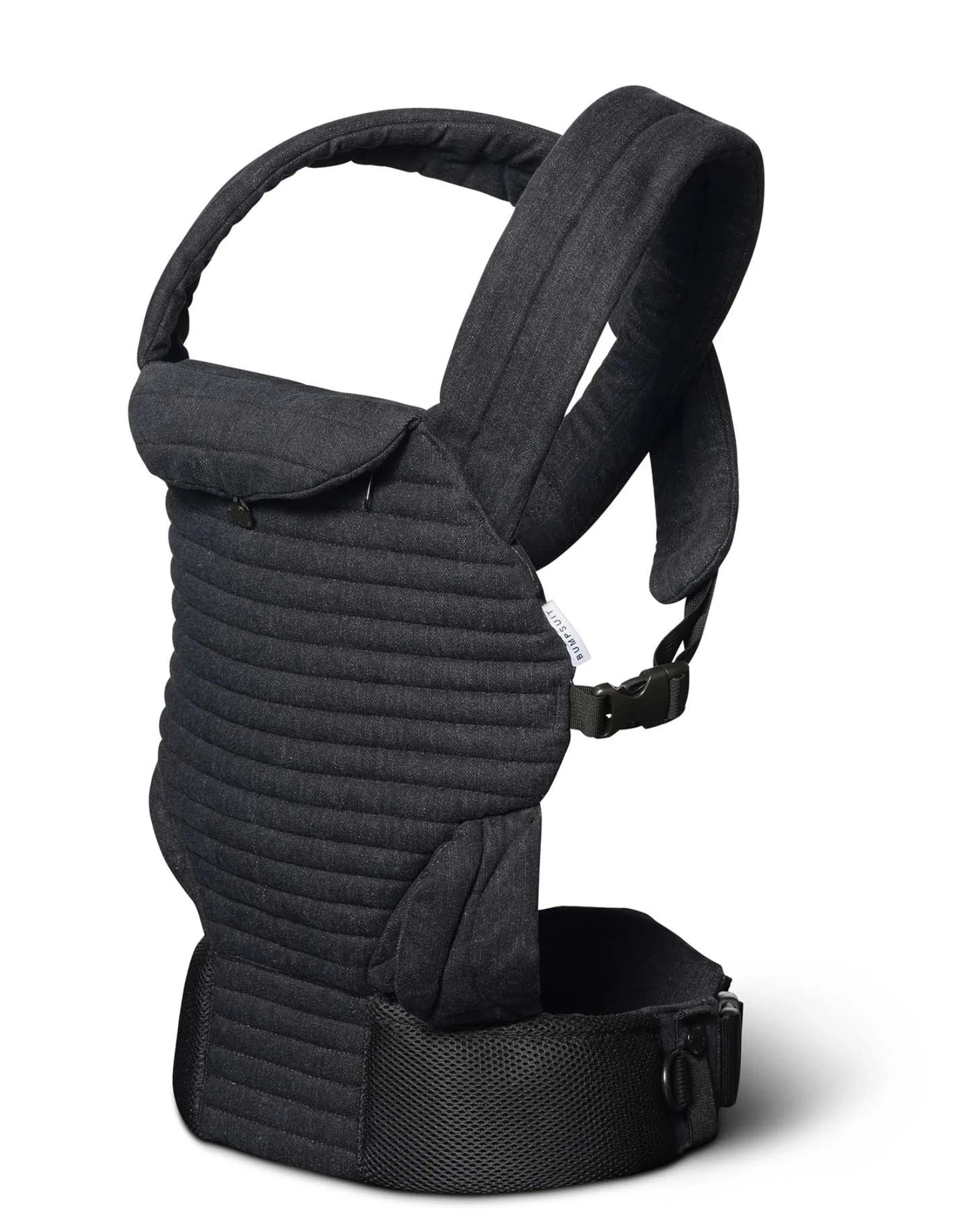 A Bumpsuit black denim quilted baby carrier with padded shoulder straps and a breathable waist belt, shown from a three-quarter angle on a white background.