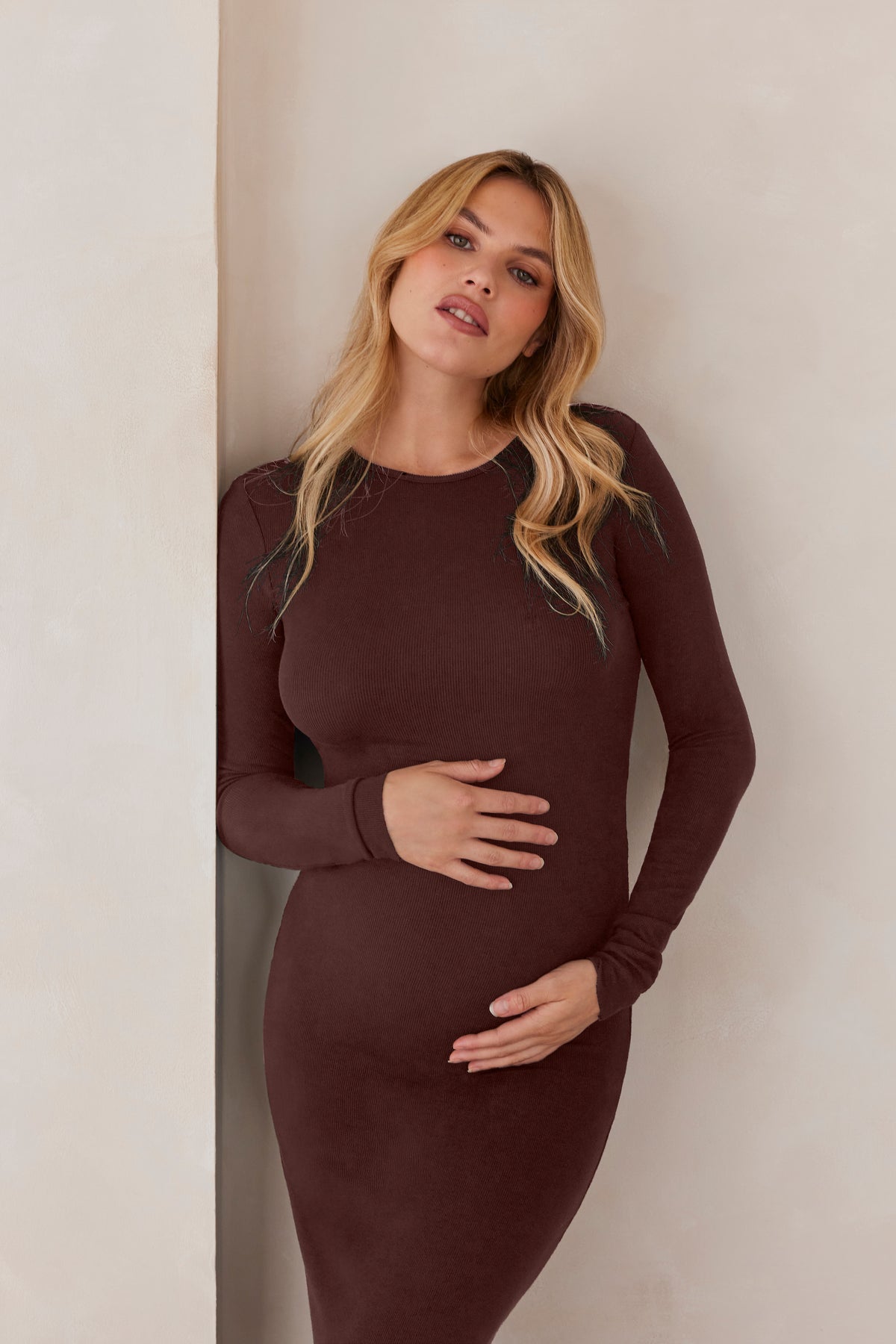 Front view of Soft Rib Maxi Long Sleeve Dress showcasing soft ribbed texture and long sleeves on a model against a light wall