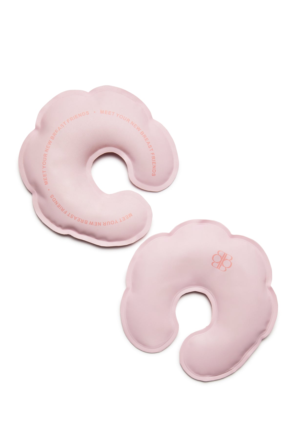 Angled view of pink HOT-N-COLD BREASTIES breast therapy packs showcasing reusable breast-shaped design on white background