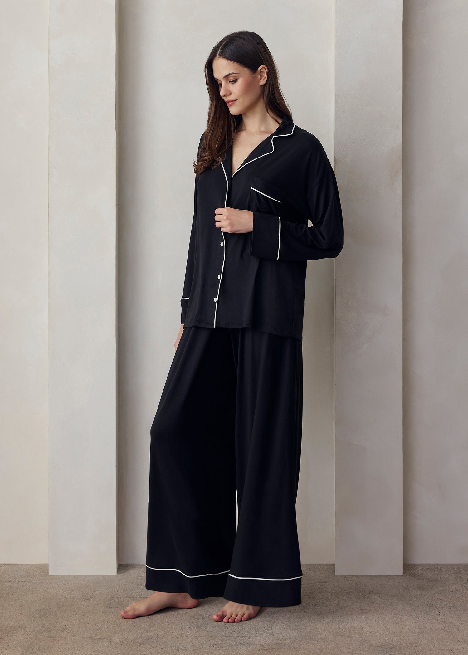 the cloud sleep set in black with white piping detail