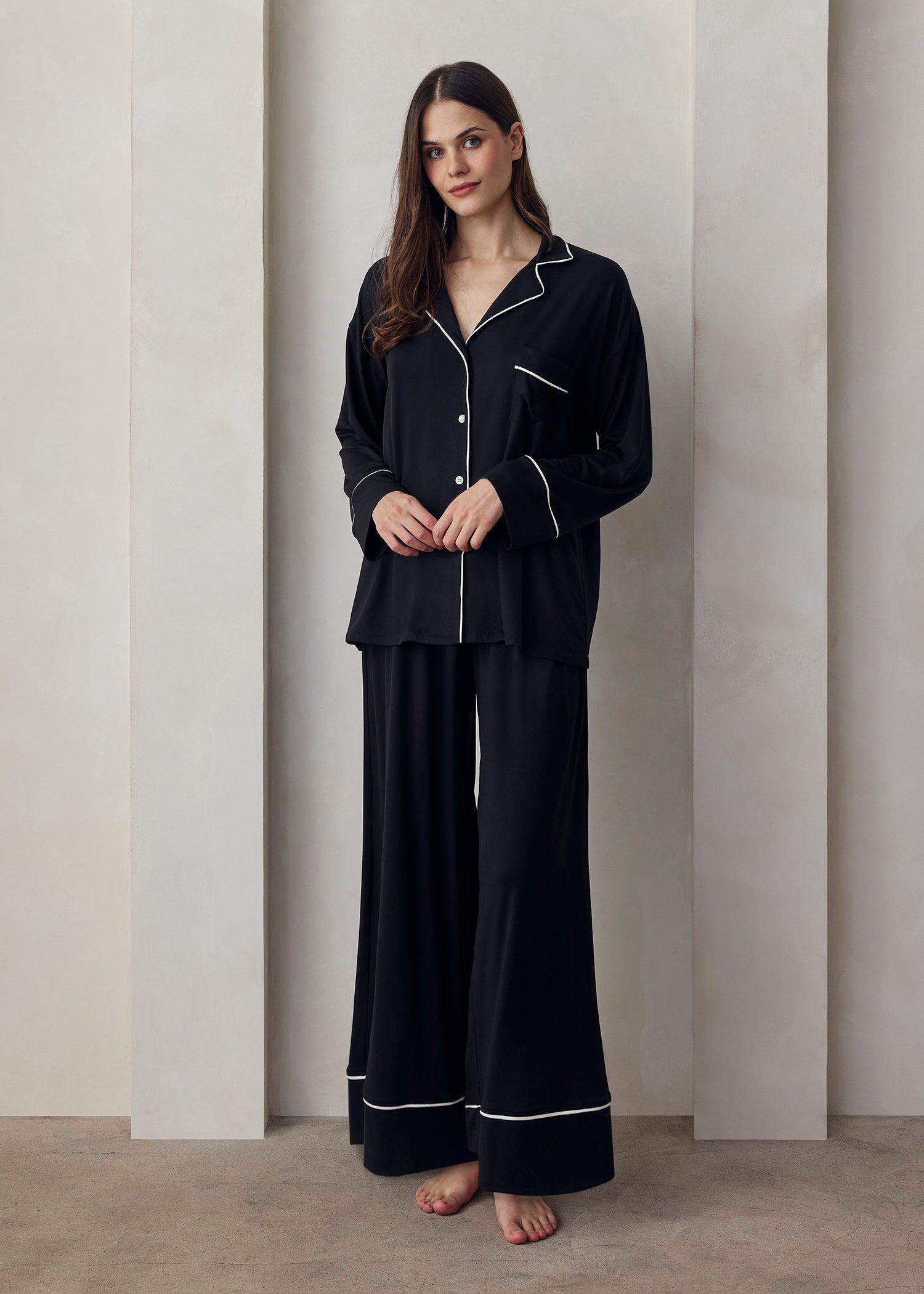 the cloud sleep set in black with white piping detail