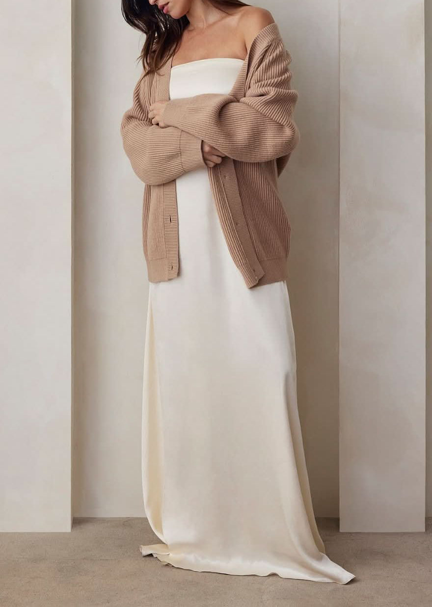 the strapless satin gown and cozy knit cardigan bumpsuit